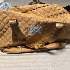 Tan Quilted Duffel Bag